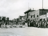 1930s, FUHS marching band marching east on east aspen ave, midwest photo, e2